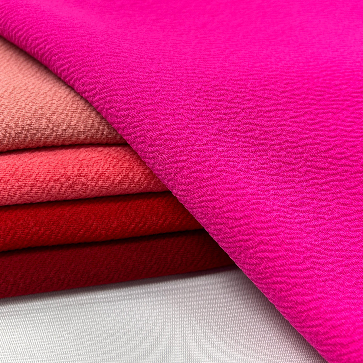 Liverpool Fabric. soft, stretchy, and tula pink fabric that displays a raised, brick shaped pattern. DIY Head Wraps & Hairbands - 40-Yard Roll