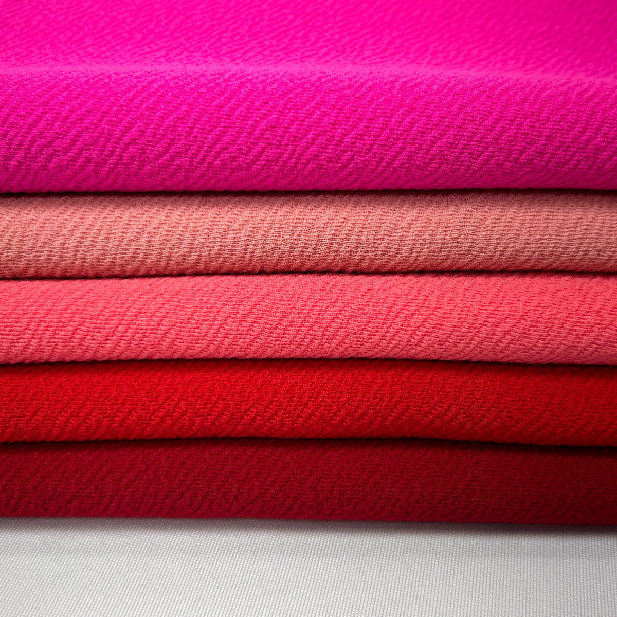 Liverpool Fabric. soft, stretchy, and tula pink fabric that displays a raised, brick shaped pattern. DIY Head Wraps & Hairbands - 40-Yard Roll