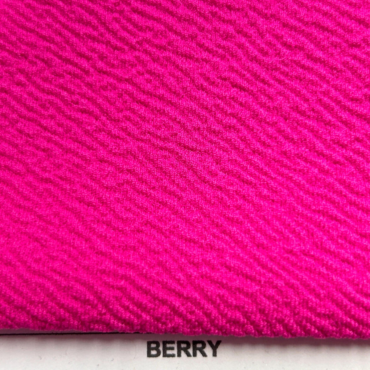 Liverpool Fabric. soft, stretchy, and tula pink fabric that displays a raised, brick shaped pattern. DIY Head Wraps & Hairbands - 40-Yard Roll
