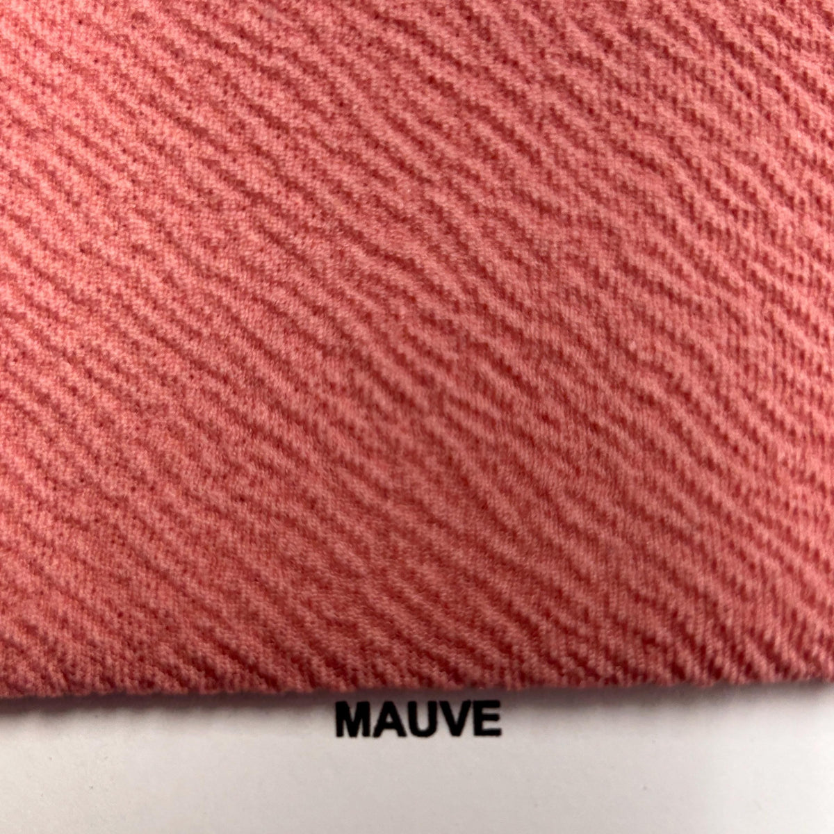 Liverpool Fabric. soft, stretchy, and tula pink fabric that displays a raised, brick shaped pattern. DIY Head Wraps & Hairbands - 40-Yard Roll