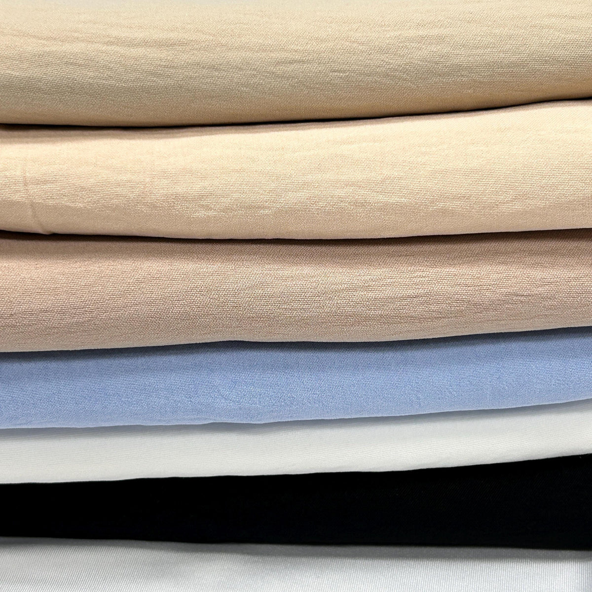 Thin Woven fabric.Milano. crush matt finish. thin stretch fabric. very smooth fit and comfy feel.