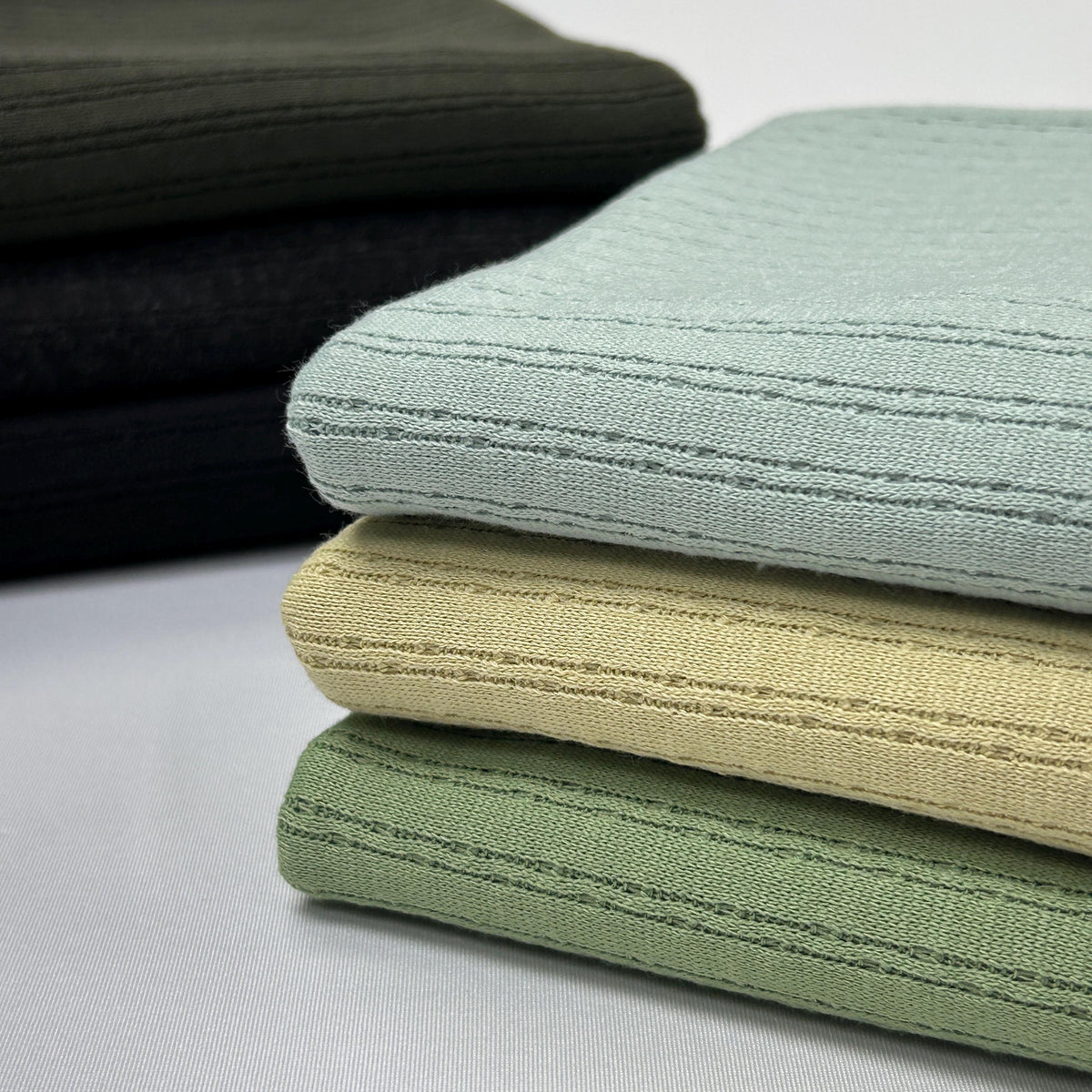 ANNIE RIB  Knit is a super soft and cozy fabric. Stretch Knit Ribbed. 60" Wide. wholesale fabric. - 40-Yard Roll